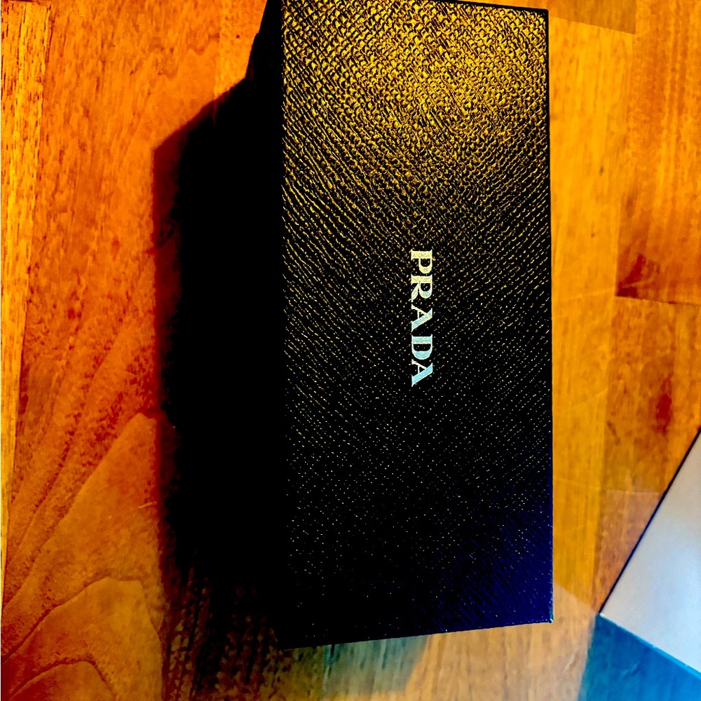 Brand new, never worn Prada glasses